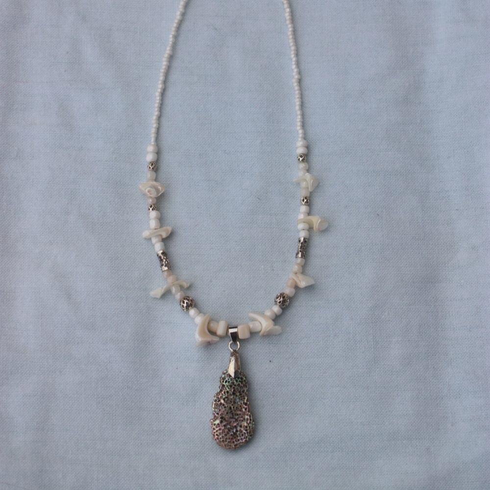 Shell pendant on shell and bead necklace (item#16)